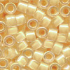 DB0067: 11/o MIYUKI DELICAS - Transparent, Light Peach Lined