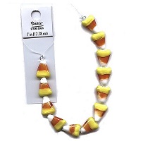 DARICE® 11x15mm Lampwork Glass CANDY CORN Beads